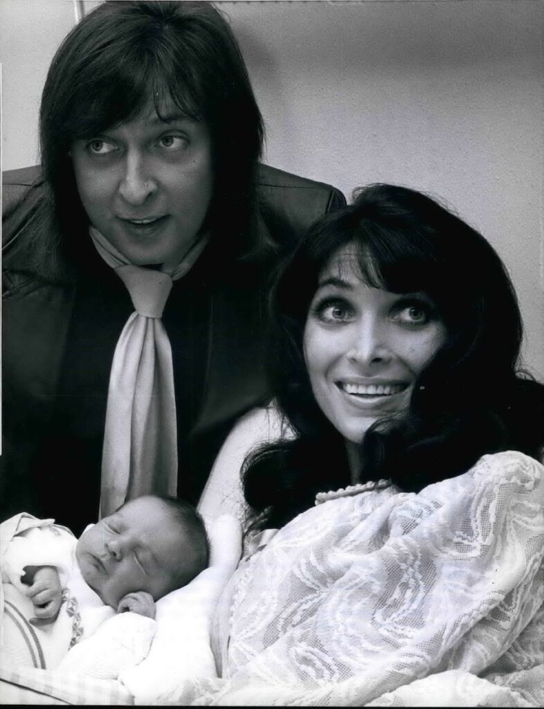 January 15, 1975 - Danny is the family star A pretty starry family is pictured here. But one day before Mr. Les Humphries, 31, is starting on his grand tour through Europe Music Halls with his renowned Les Humphries Choir his charming wife Dunja Rajter, 33, who is a singer herself, gave birth to their first child, a boy, on January 15, 1974. OPS: The proud parents, Mr. Les Humphries and his wife, Dunja Rajter, present here most happily their 3-days old son Danny. London United Kingdom PUBLICATIONxINxGERxSUIxAUTxONLY - ZUMAk09_